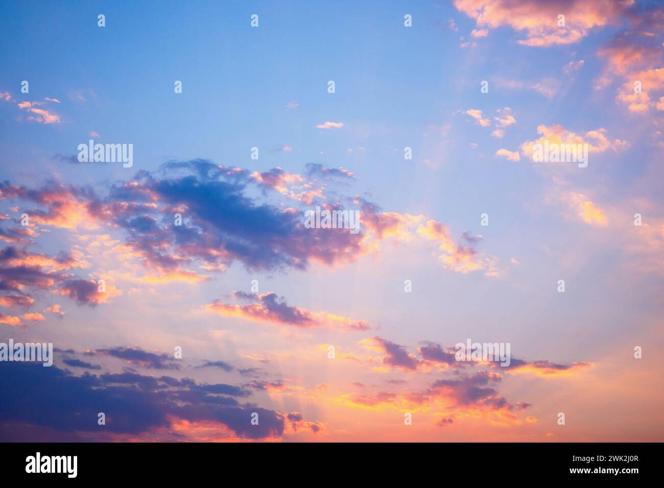 Abstract sunset sky with clouds nature background Stock Photo - Alamy