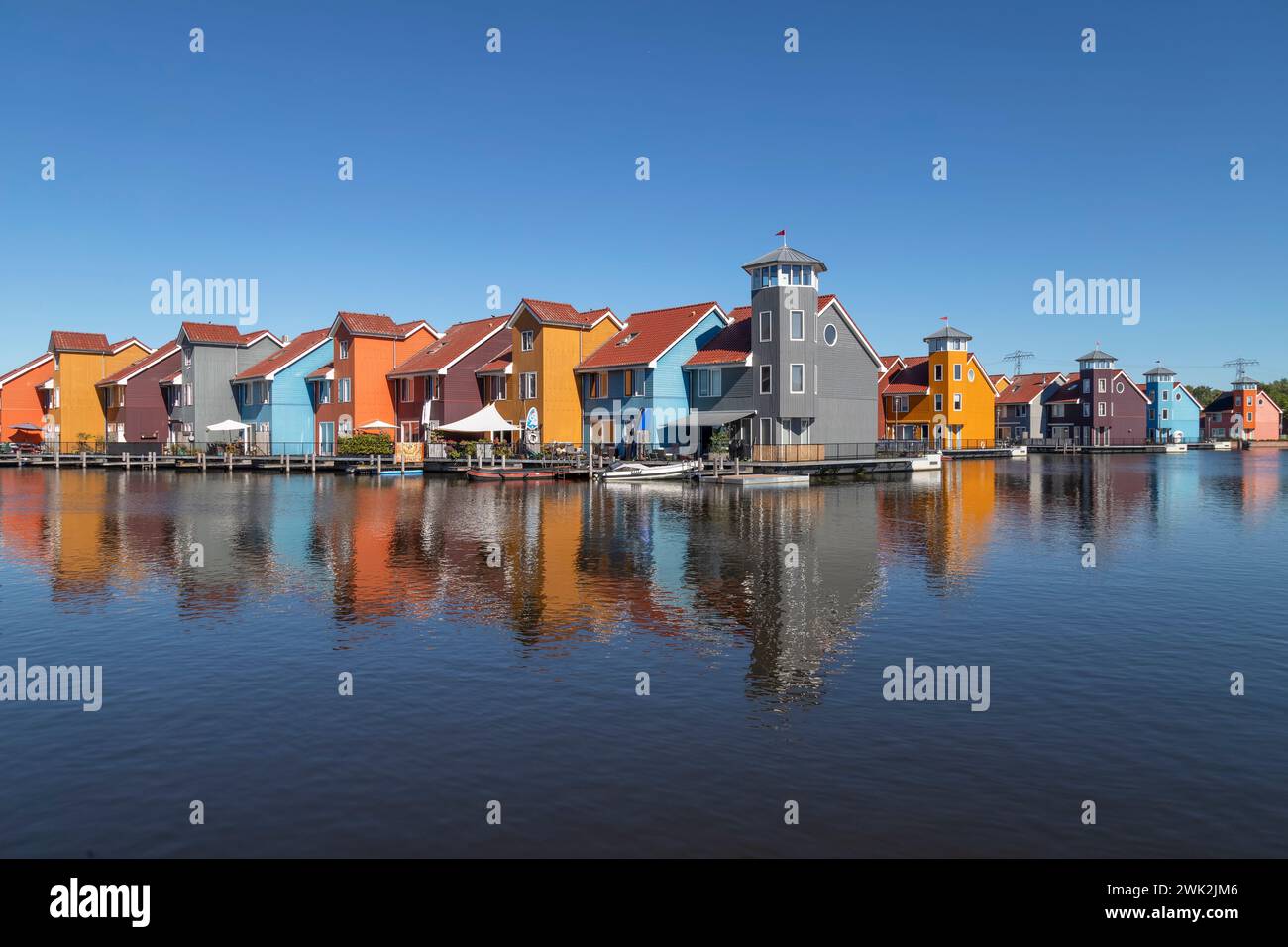 Colorful promenade and pier houses at the Reitdiephaven in Groningen. Stock Photo