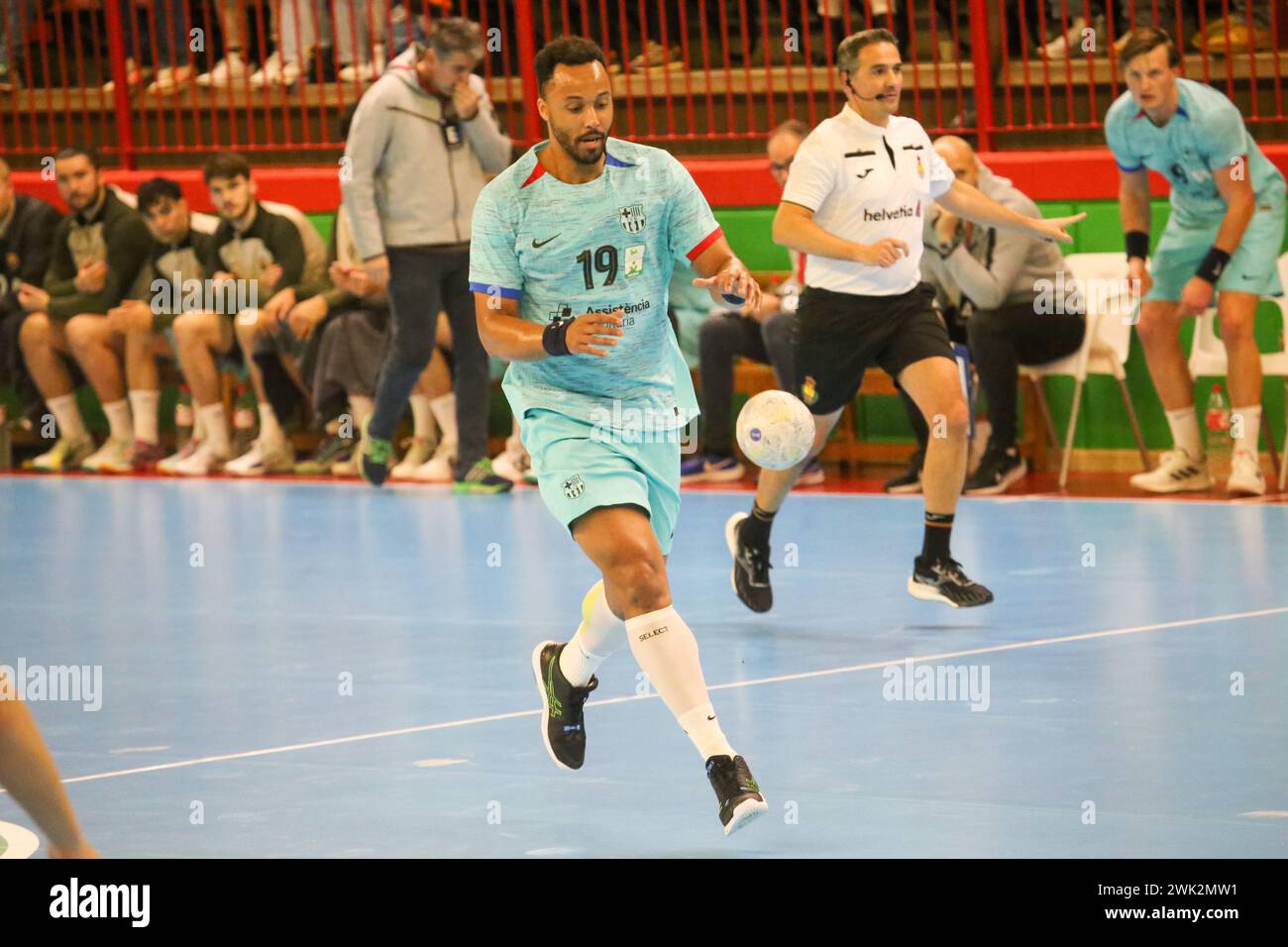 Torrelavega, Cantabria, Spain. 17th Feb, 2024. Torrelavega, Spain, February 17th, 2024: Barça player, Thimotey NÂ´Guessan (19) dribbles the ball during the 18th matchday of the Plenitude League between Bathco BM. Torrelavega and Barça, on February 17, 2024, at the Vicente Trueba Municipal Pavilion in Torrelavega, Spain. (Credit Image: © Alberto Brevers/Pacific Press via ZUMA Press Wire) EDITORIAL USAGE ONLY! Not for Commercial USAGE! Stock Photo