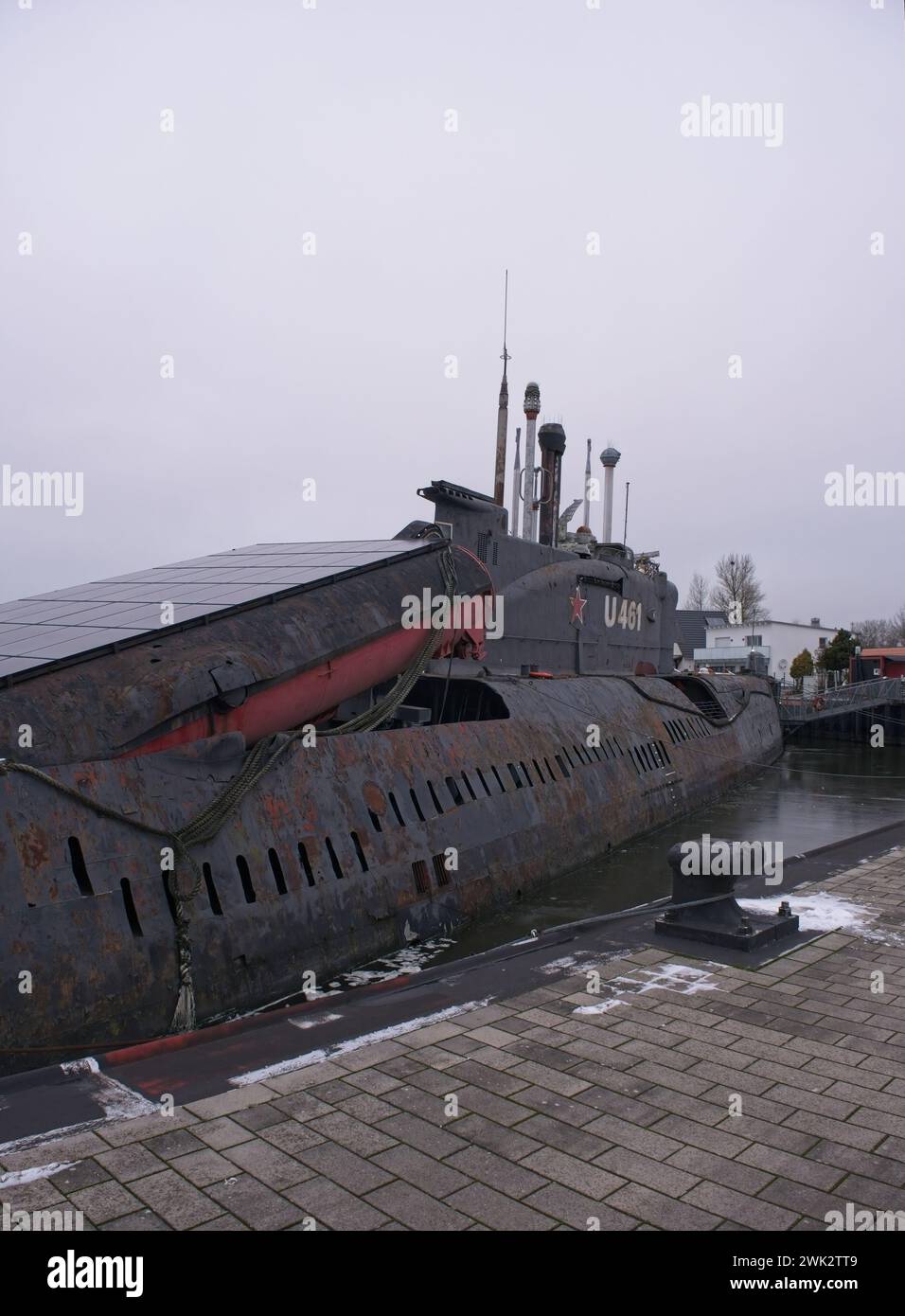 Peenemunde, Germany - Jan 10, 2024: Conventionally powered submarine JULIETT U-461. Former Baltic red banner fleet and pier of the 1st Flotilla. Cloud Stock Photo