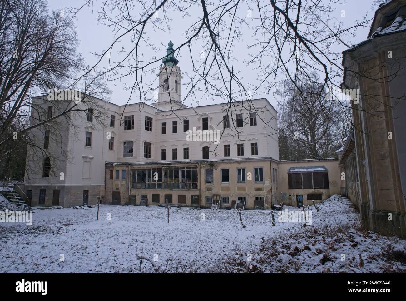 Wandlitz, Germany - Jan 17, 2024: SS chief Himmler took over in 1940 and used Schloss Dammsmuhle as his base and as an elegant boarding house. Cloudy Stock Photo