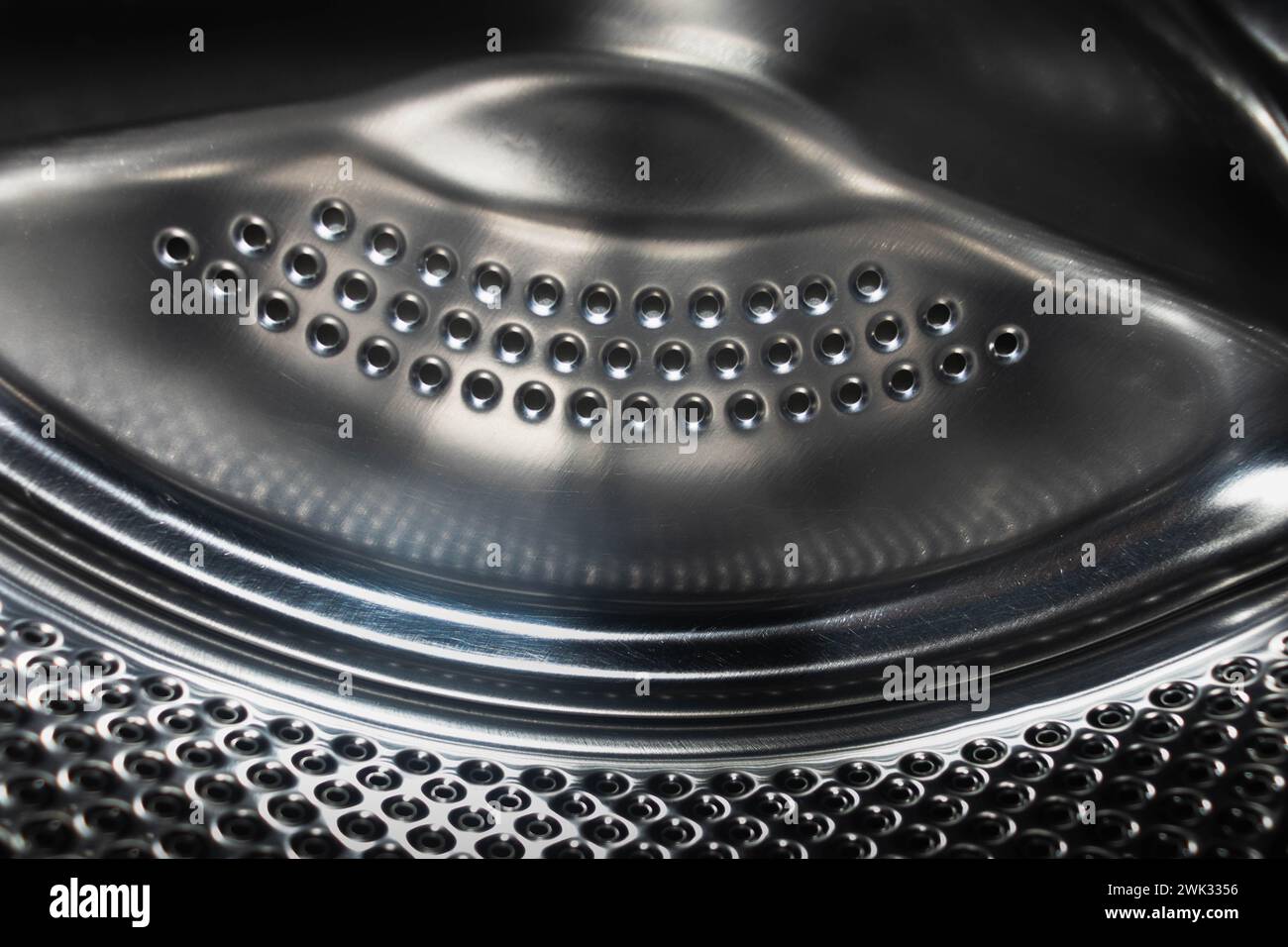 Stainless metal surface of the washing machine drum.inner metal drum of