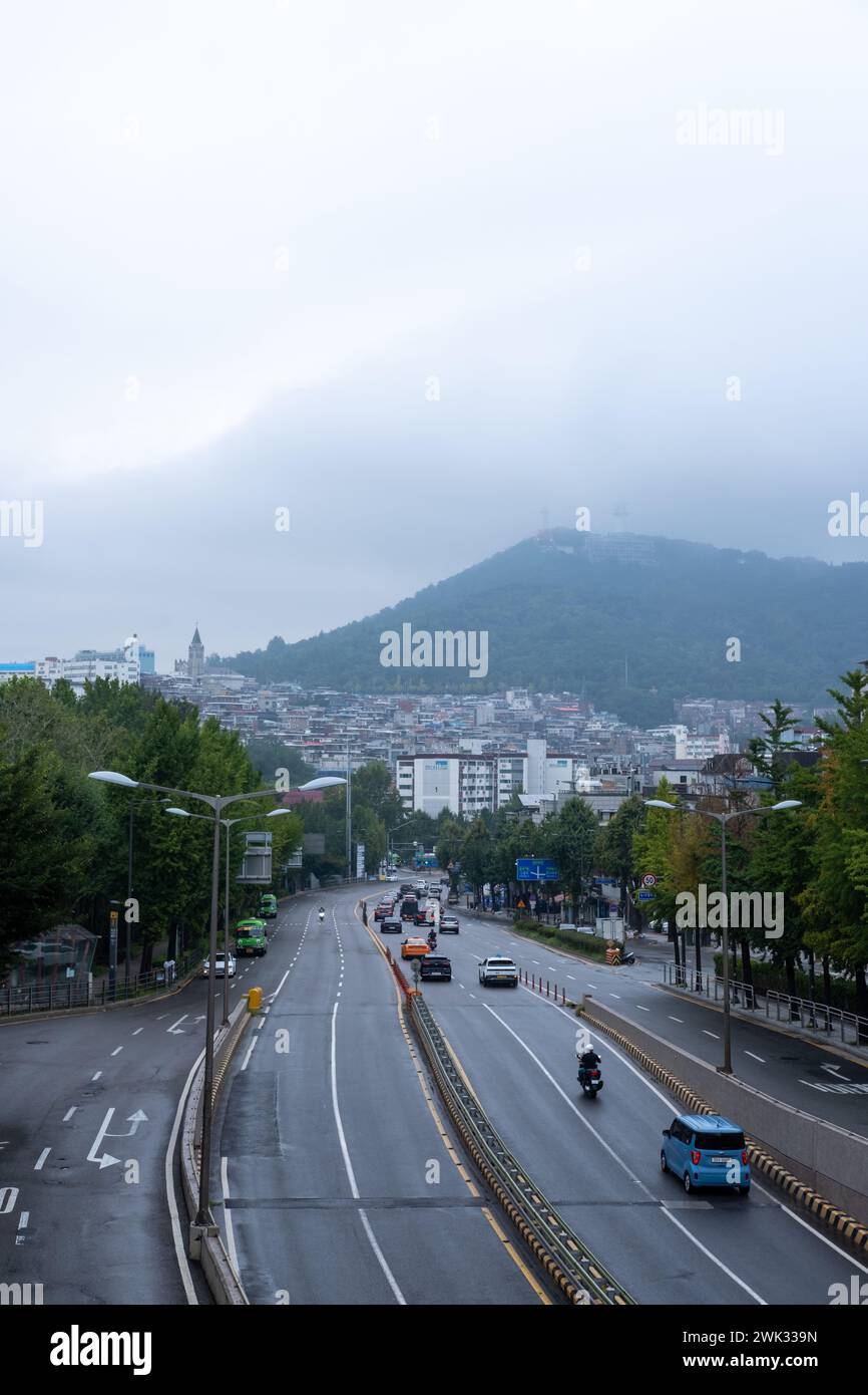 Seoul, South Korea - 3 September 2023: View of N Seoul Tower disappeared in the cloud from Noksapyeong Bridge, one of the famous locations from Korean Stock Photo