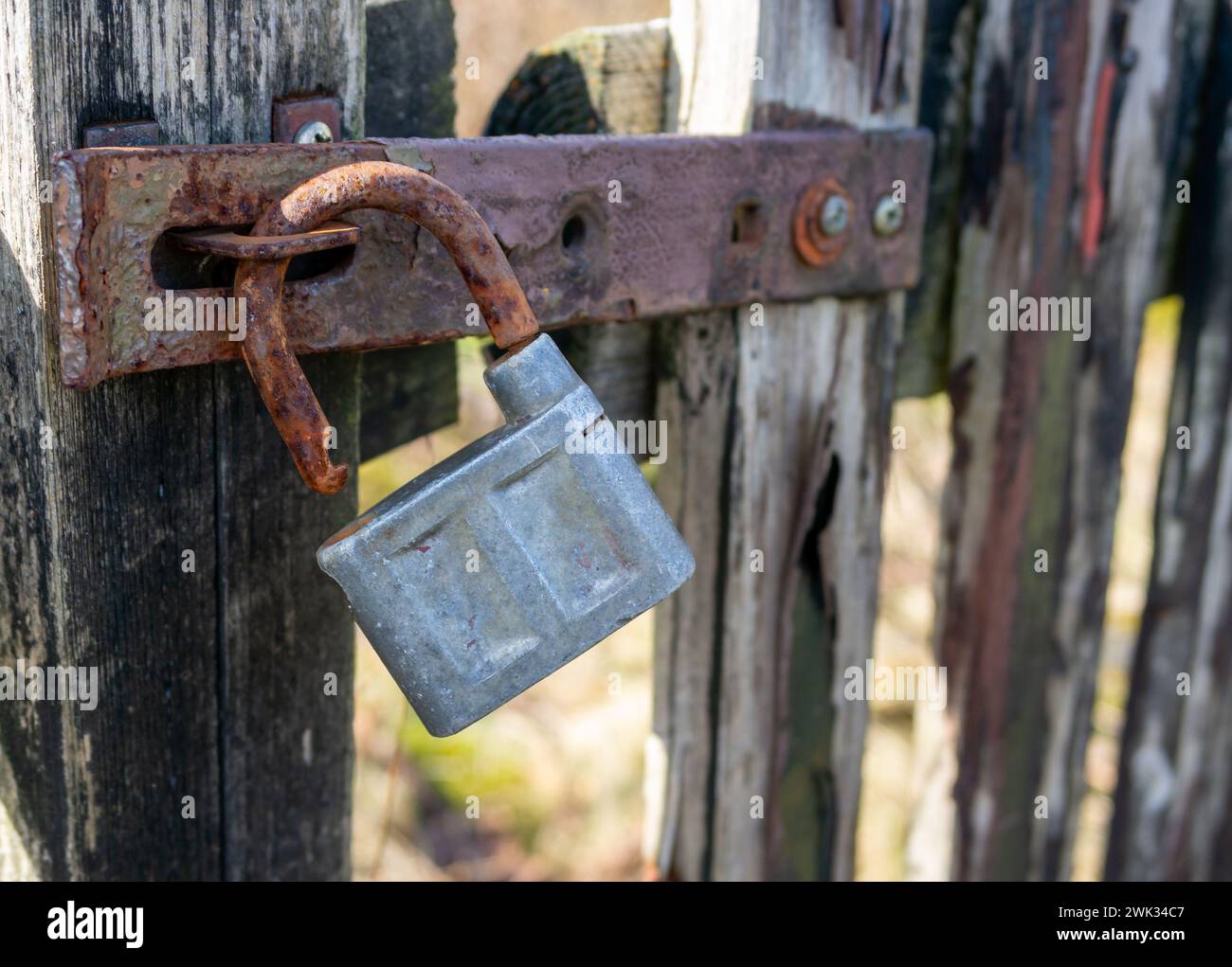 old rusty padlock on the door Stock Photo