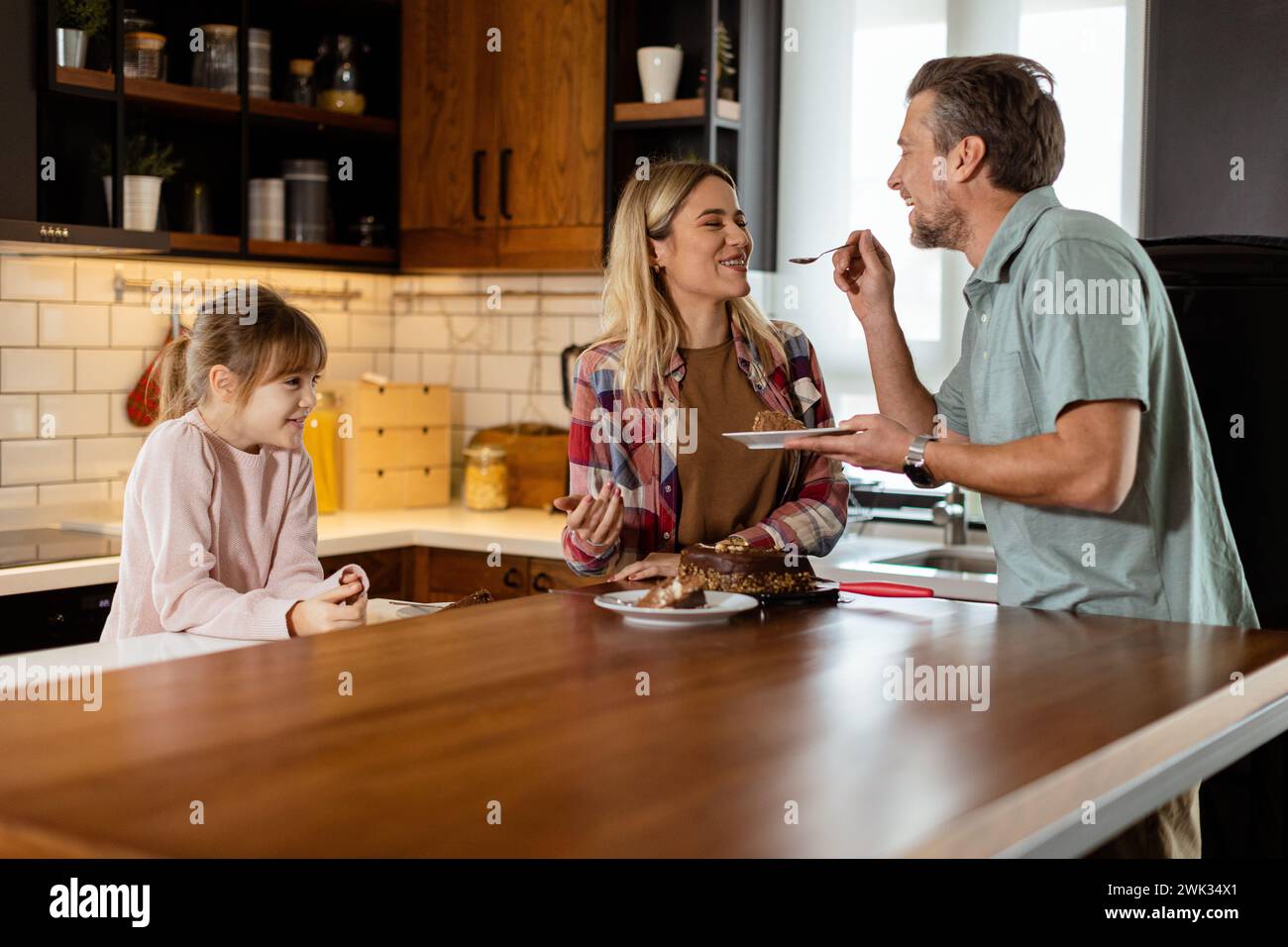 Family celebration unfolds hi-res stock photography and images - Alamy