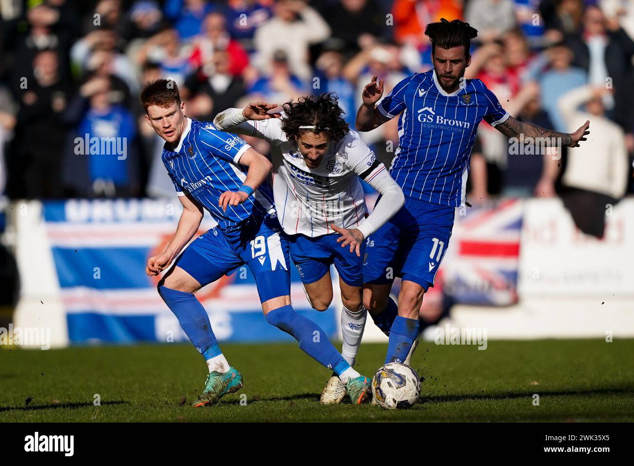 Rangers' Fabio Silva is challenged by St Johnstone's Luke Robinson (left) and St Johnstone's Graham Carey (right) during the cinch Premiership match at McDiarmid Park, Perth. Picture date: Sunday February 18, 2024. Stock Photo