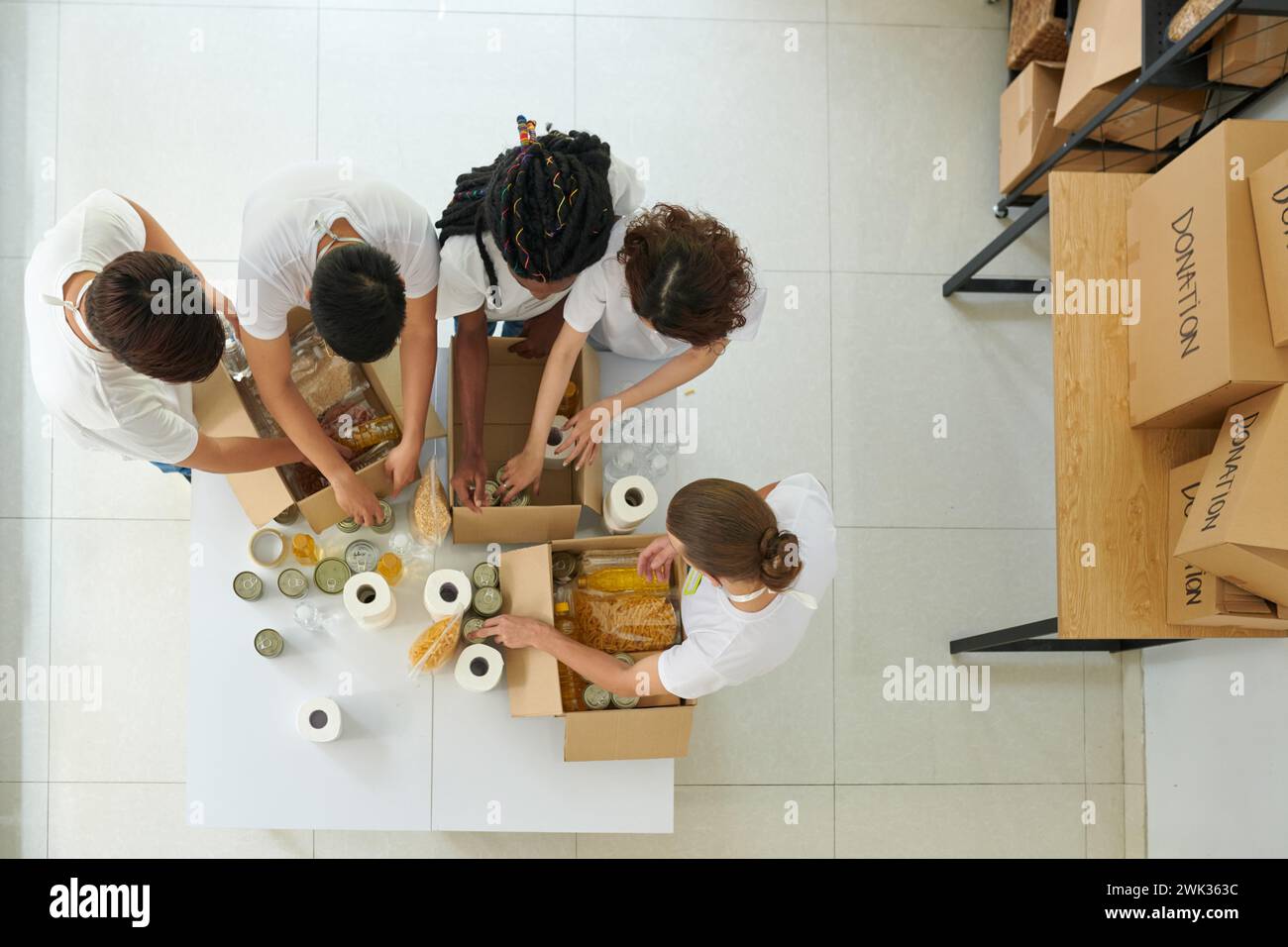 Donation boxes to homeless woman hi-res stock photography and images ...