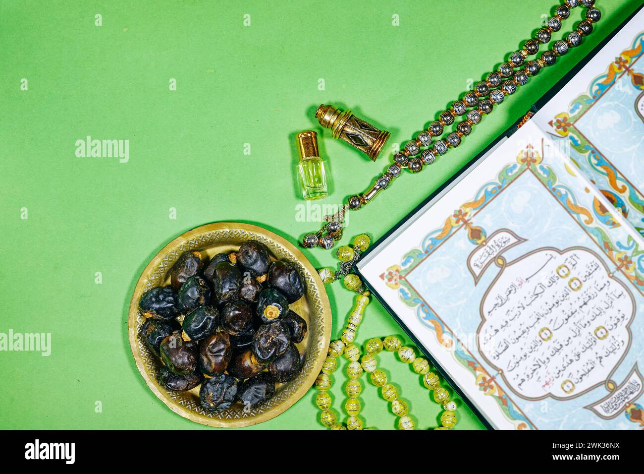 open muslim book with arabic calligraphy Quran translation holy book of Muslims and oud