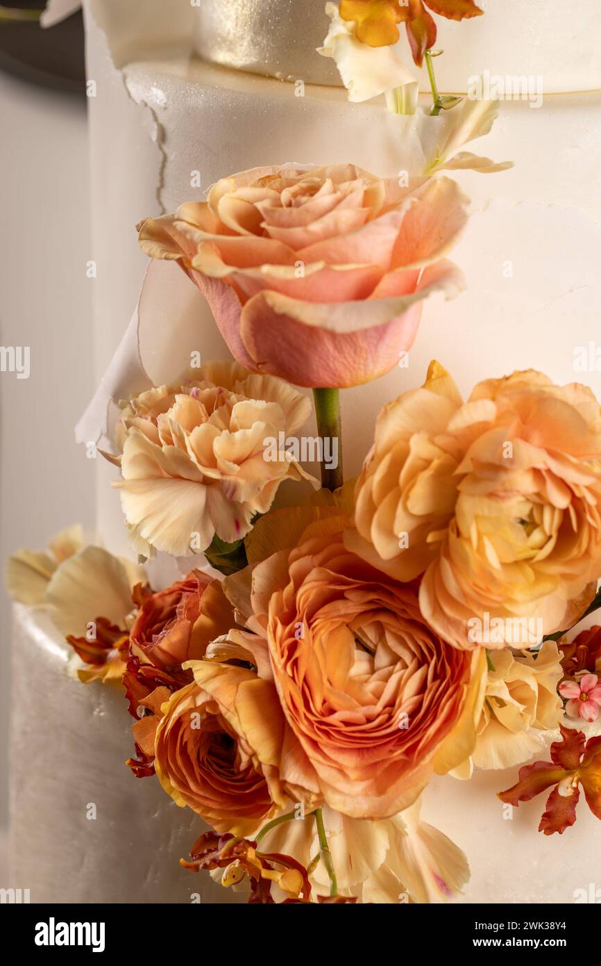 Simple wedding cake with flowers, close up Stock Photo