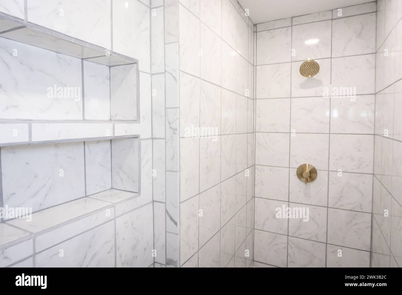 Curated visual reference: Gallery Detail: White And Gray Marbled Tile Large Empty Recently Renovated Home