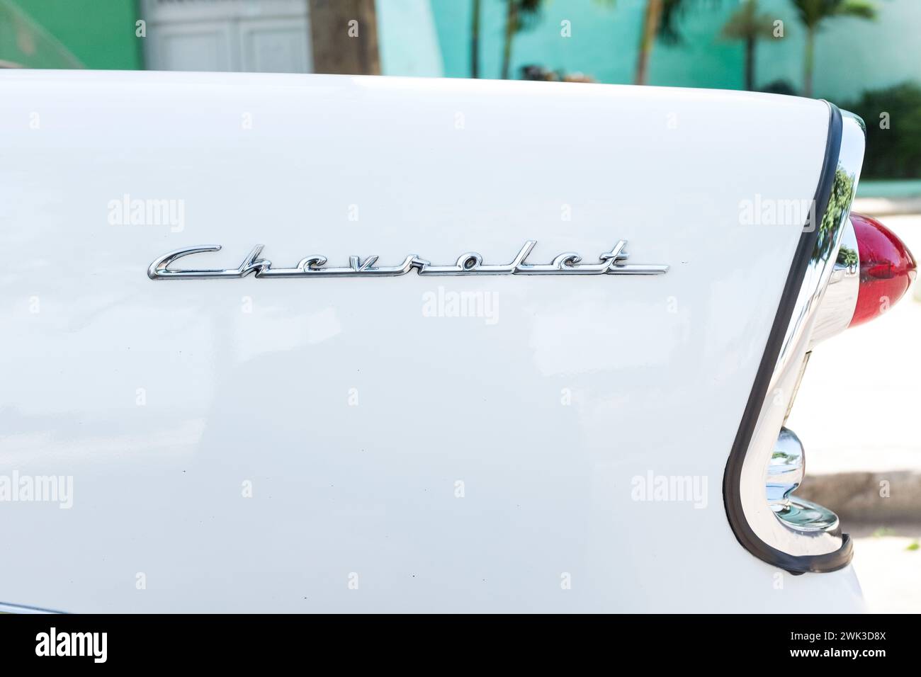 Lettering on the rear fender of a 1956 Chevrolet Bel Air. Stock Photo