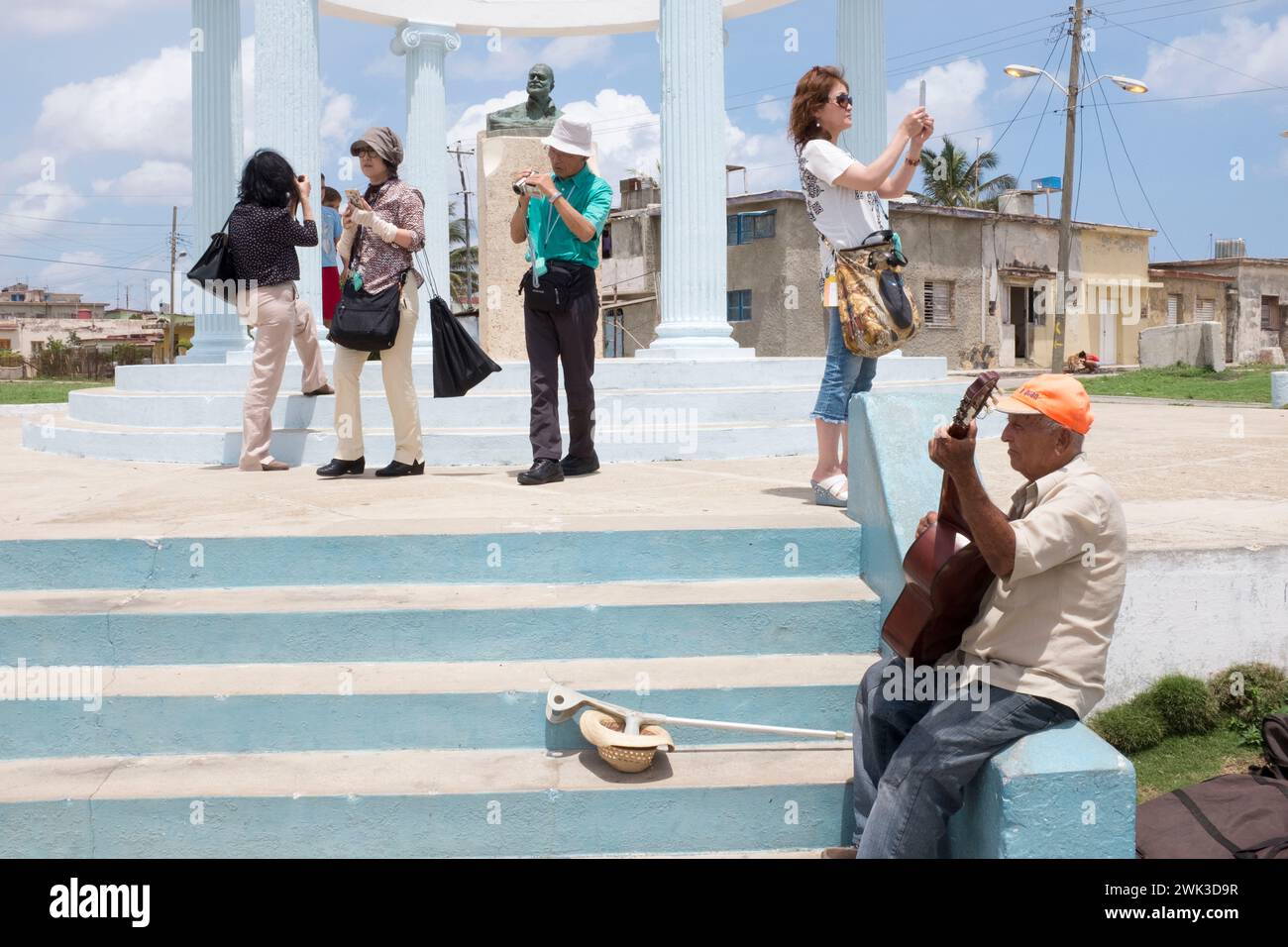 Tourists at the Hemingway monument in the fishing village of Cojimar, near Havana. Stock Photo