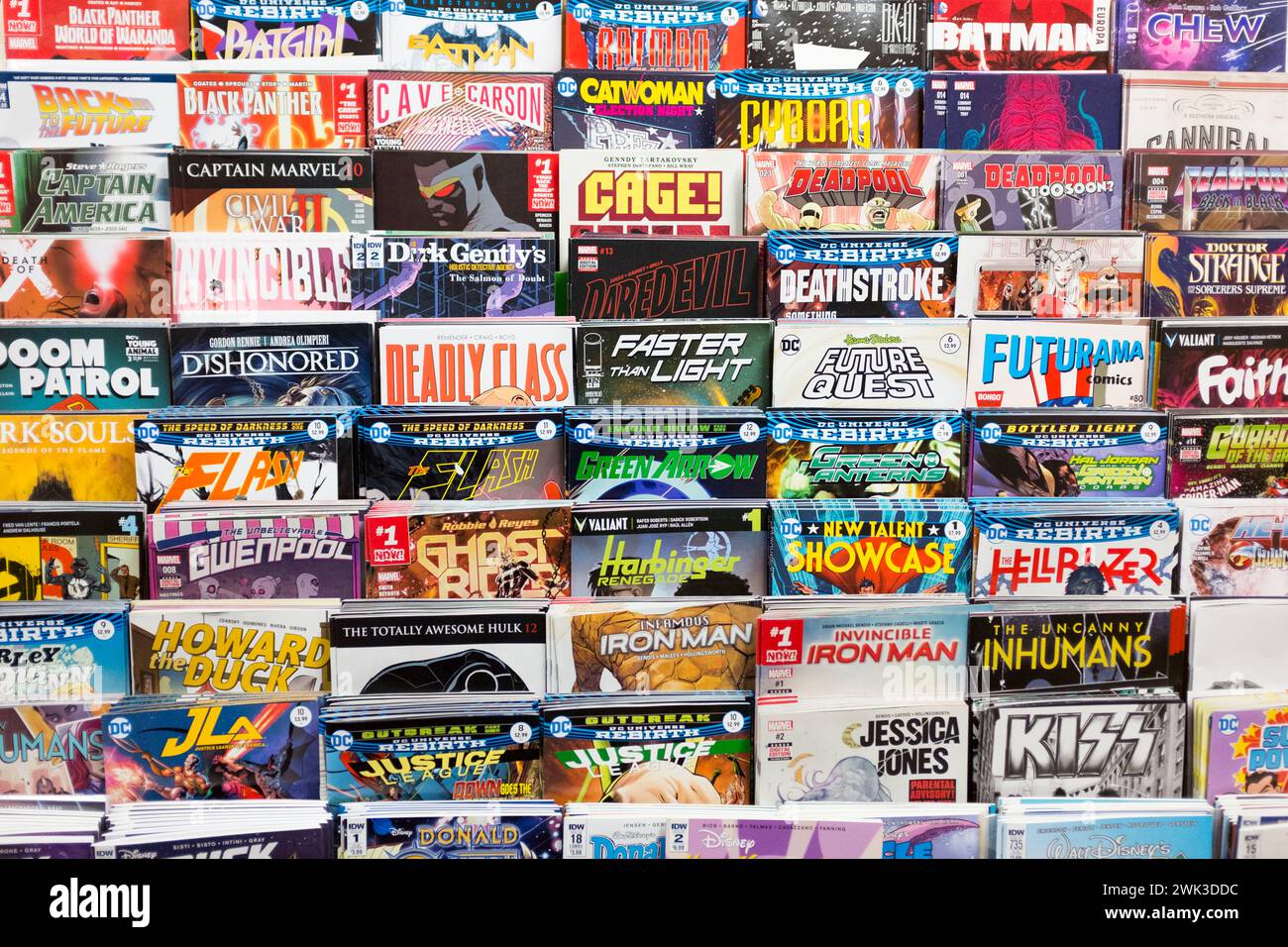 Variety of comic books in a shelf. Stock Photo
