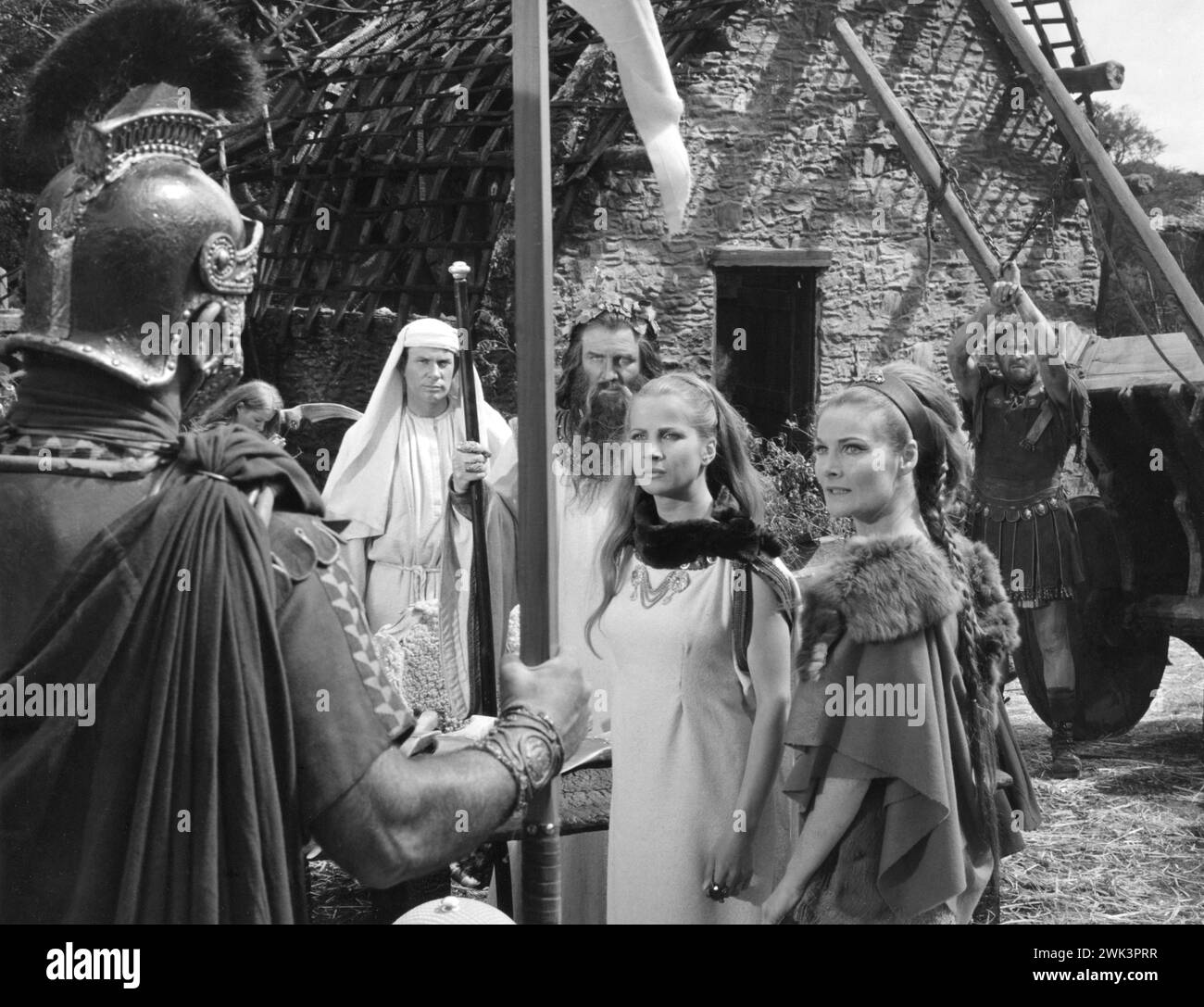 CARITA and ADRIENNE CORRI in a scene from THE VIKING QUEEN 1967 Director DON CHAFFEY Original Story JOHN TEMPLE-SMITH Costume Design JOHN FURNISS Music PHILIP MARTELL A Hammer Film Production / Warner-Pathe Stock Photo
