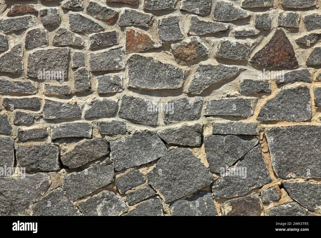Granite wall, background. Surface of stone structure built of granite ...