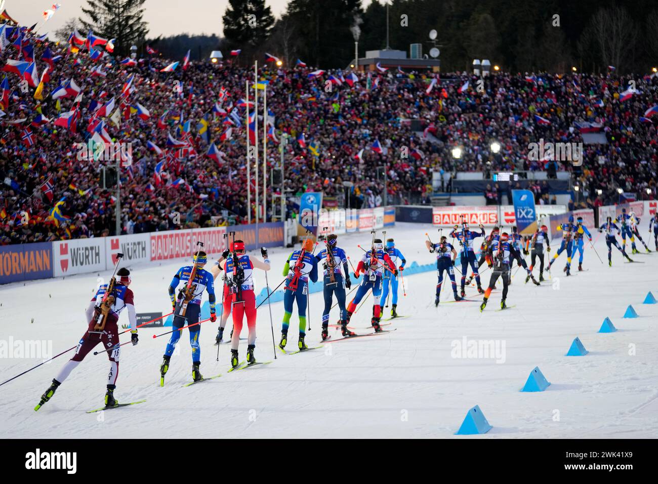 Athletes compete during the men's 15 km mass start race at the Biathlon