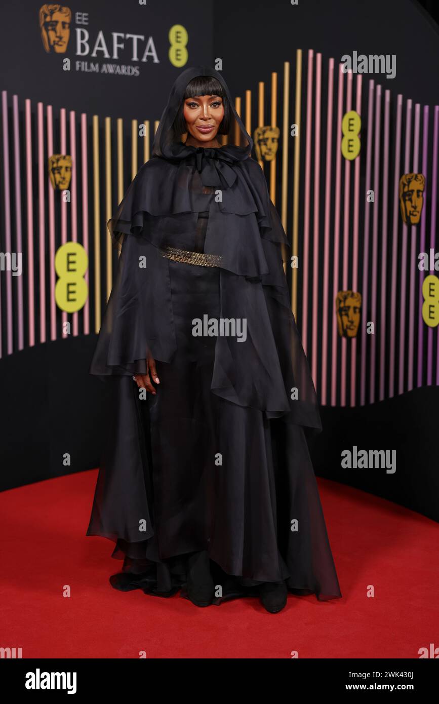 Naomi Campbell poses for photographers upon arrival at the 77th British