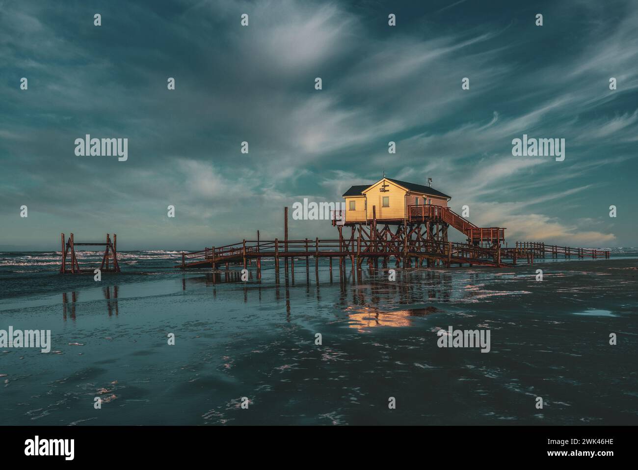 Pile dwelling on the beach of Sankt Peter-Ording in Germany. Stock Photo