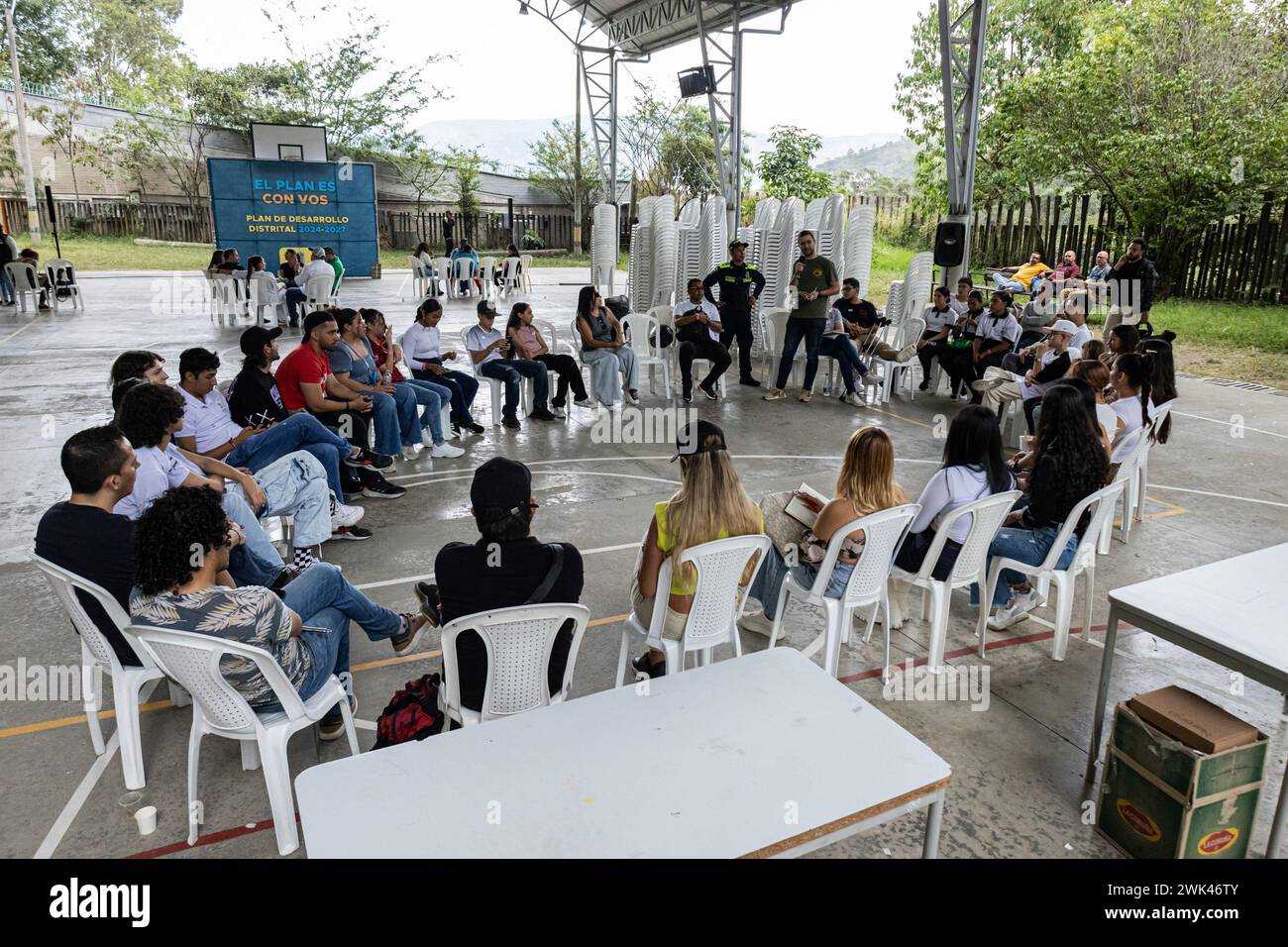 Bogota, Colombia. 17th Feb, 2024. Citizens of the Alta Vista neighborhood in Medellin, Colombia participate during a cultural and listening space called 'El Plan es con Vos' where the city's townhall aims to receive feedback for their new district ordinance plan, on february 17, 2024. Photo by: Juan Jose Patino/Long Visual Press Credit: Long Visual Press/Alamy Live News Stock Photo