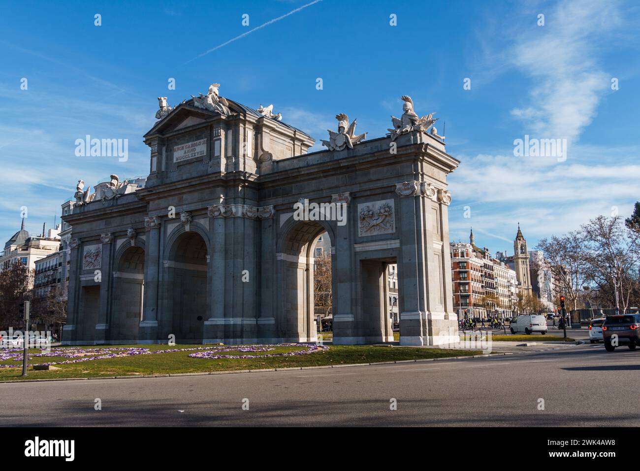 Madrid, Spain - January 28, 2024: The Puerta de Alcala Neo-classical gate in the Plaza de la Independencia. Newly restored iconic monument Stock Photo