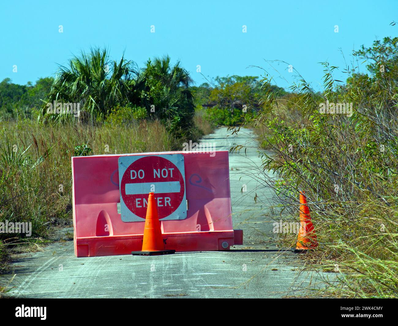 Miami, Florida, United States - February 18, 2019: Blocked dilapidated road. This was the entrance to the former Chekika Recreation Area in Everglades Stock Photo