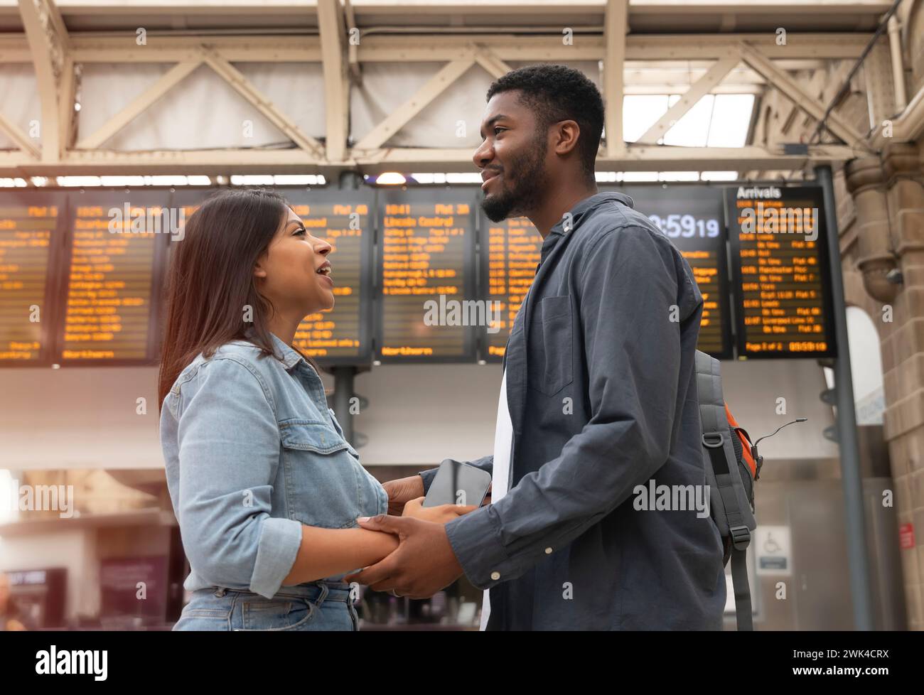Girl on train station backpack hi-res stock photography and images - Alamy
