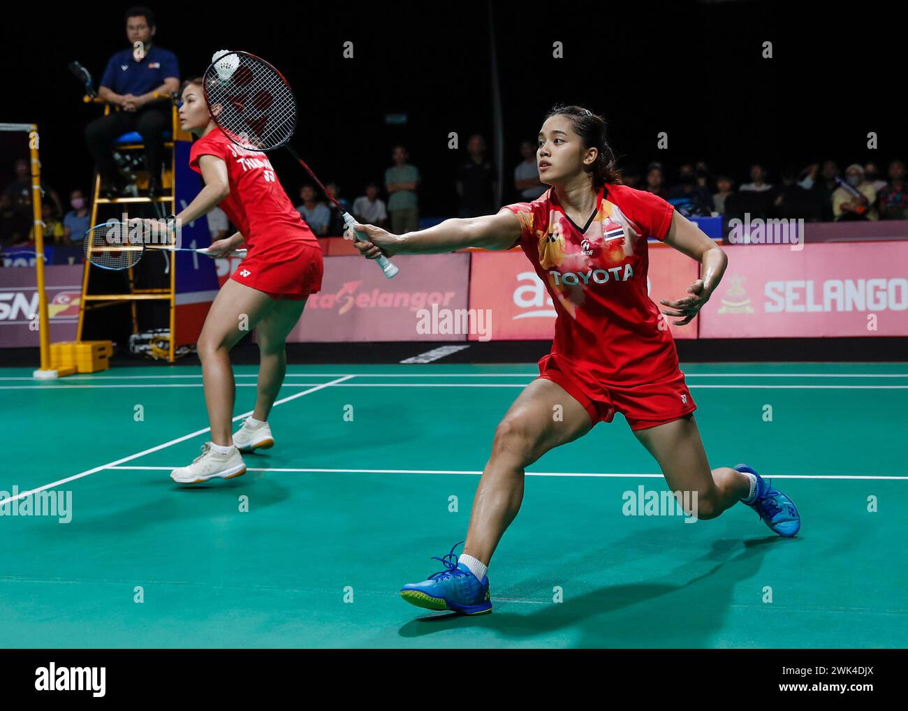 Kuala Lumpur, Malaysia. 18th Feb, 2024. Jongkolphan Kititharakul (L) and Rawinda Projongjai of Thailand seen in action against Gayatri Gopichand Pullela and Treesa Jolly of India (not pictured) during the Women's Doubles final match at the Badminton Asia Team Championships 2024 at Setia City Convention Centre in Shah Alam. Gayatri Gopichand Pullela and Treesa Jolly won with scores; 21/18/21 : 16/21/16. Credit: SOPA Images Limited/Alamy Live News Stock Photo