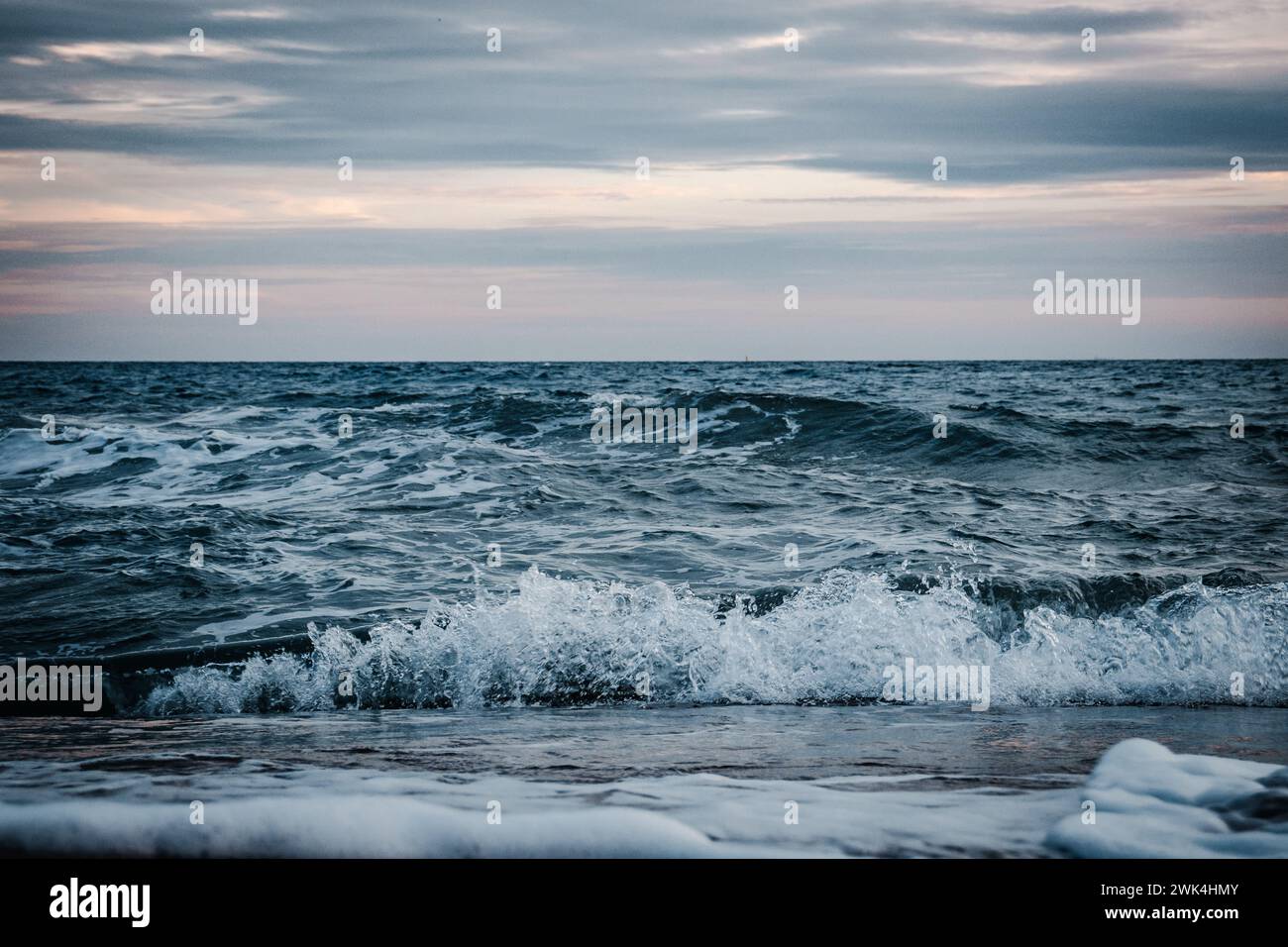 Stormy Mediterranean sea water landscape photo. Beautiful nature scenery photography with evening on background. Idyllic scene. High quality picture f Stock Photo