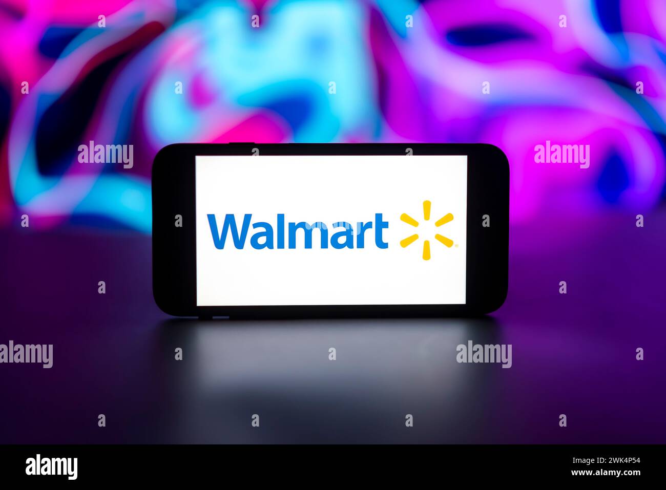 Walmart Wireless Sign In this photo illustration, the Walmart logo is seen displayed on a ...