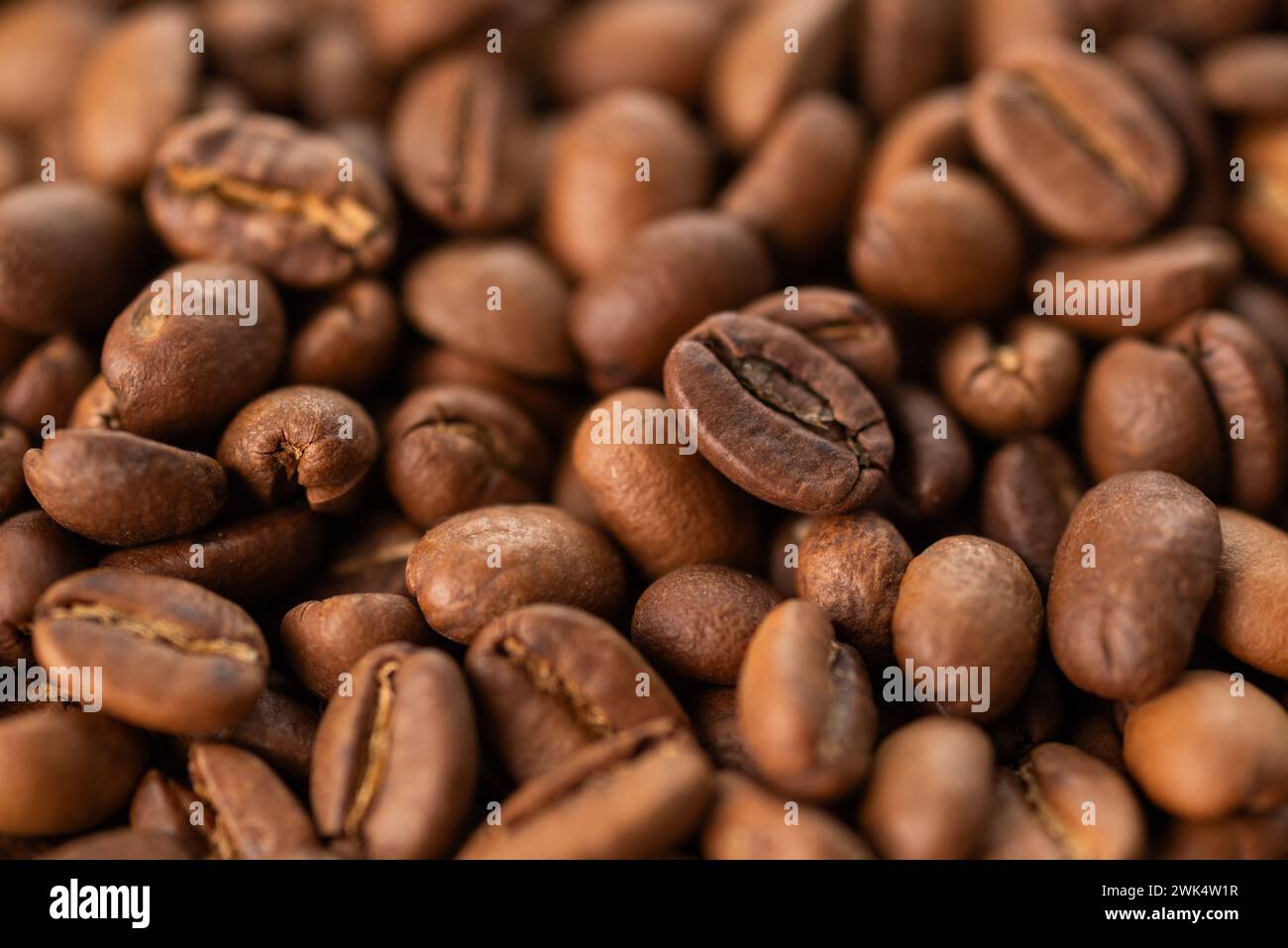 Brown roasted coffe beans, close up image. High quality photo Stock Photo