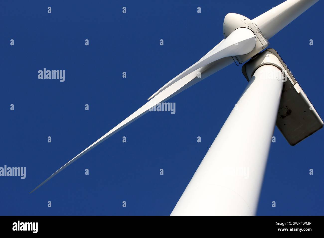 Close up of a windturbine and a pale blue sky, The Netherlands Stock Photo