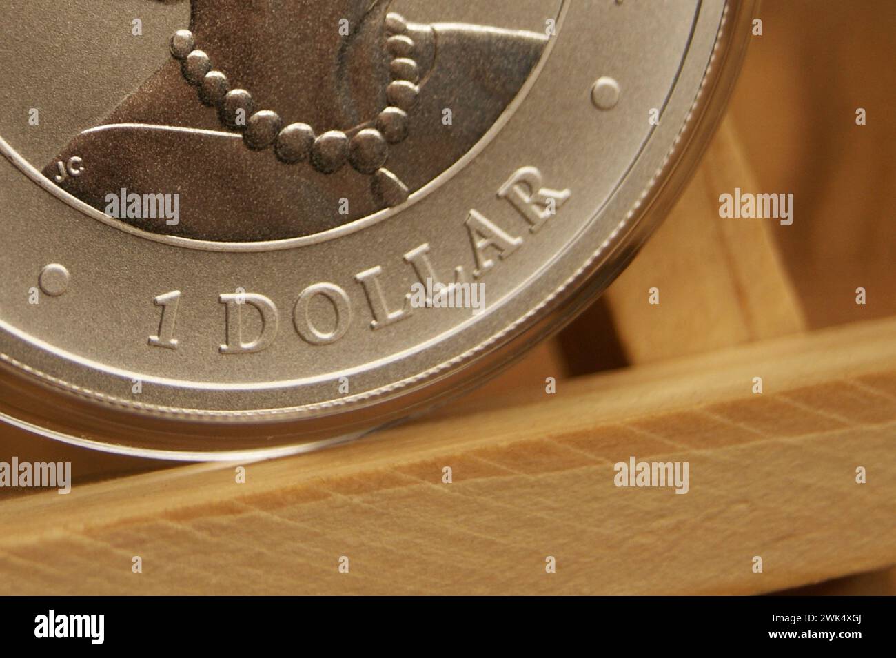 Fragment of an Australian silver coin. 1 dollar close up Stock Photo