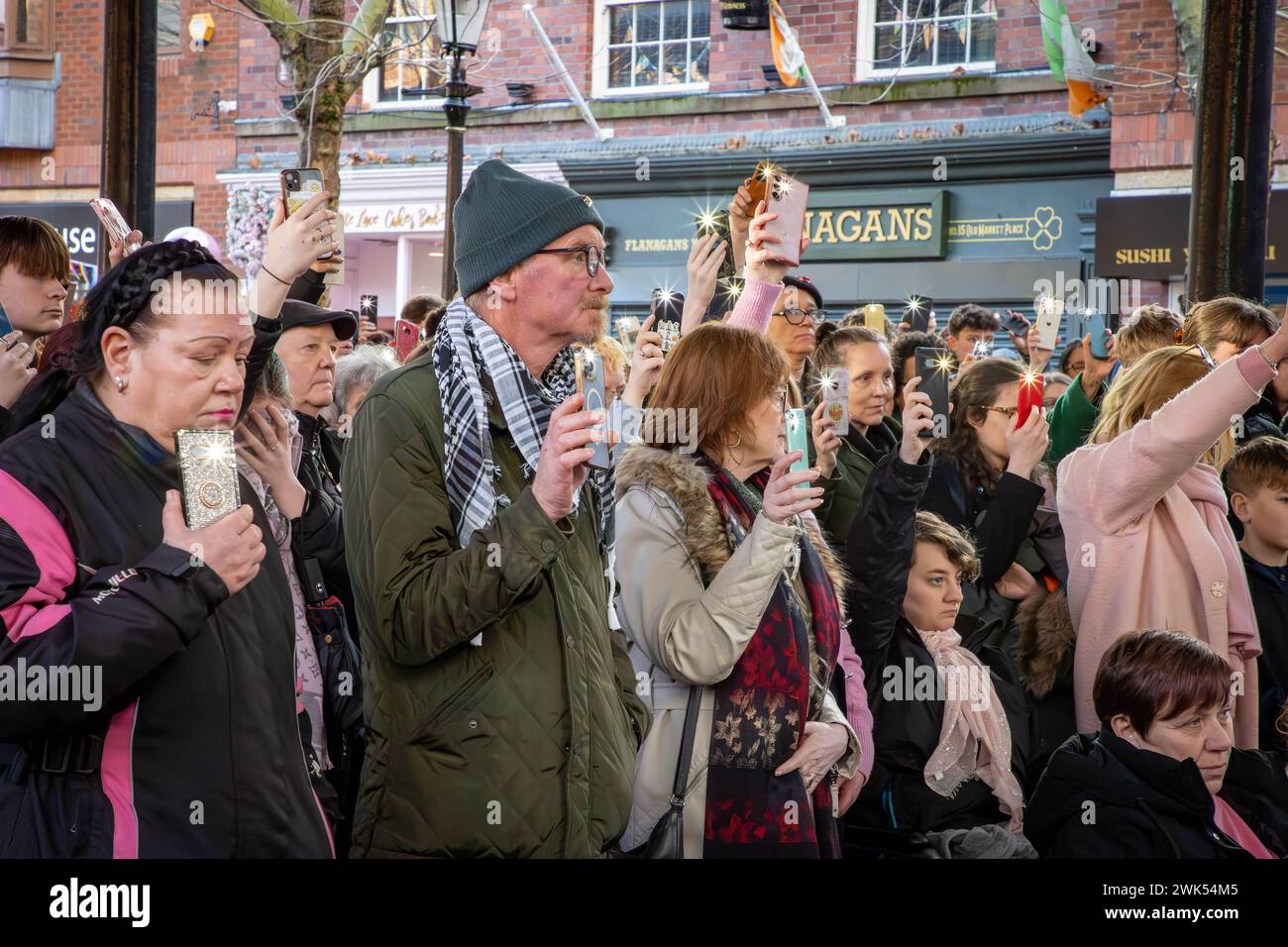 Phone torches held aloft for two minutes silence in memory of Brianna Ghey, a 16-year-old British transgender girl, was murdered in a premeditated att Stock Photo