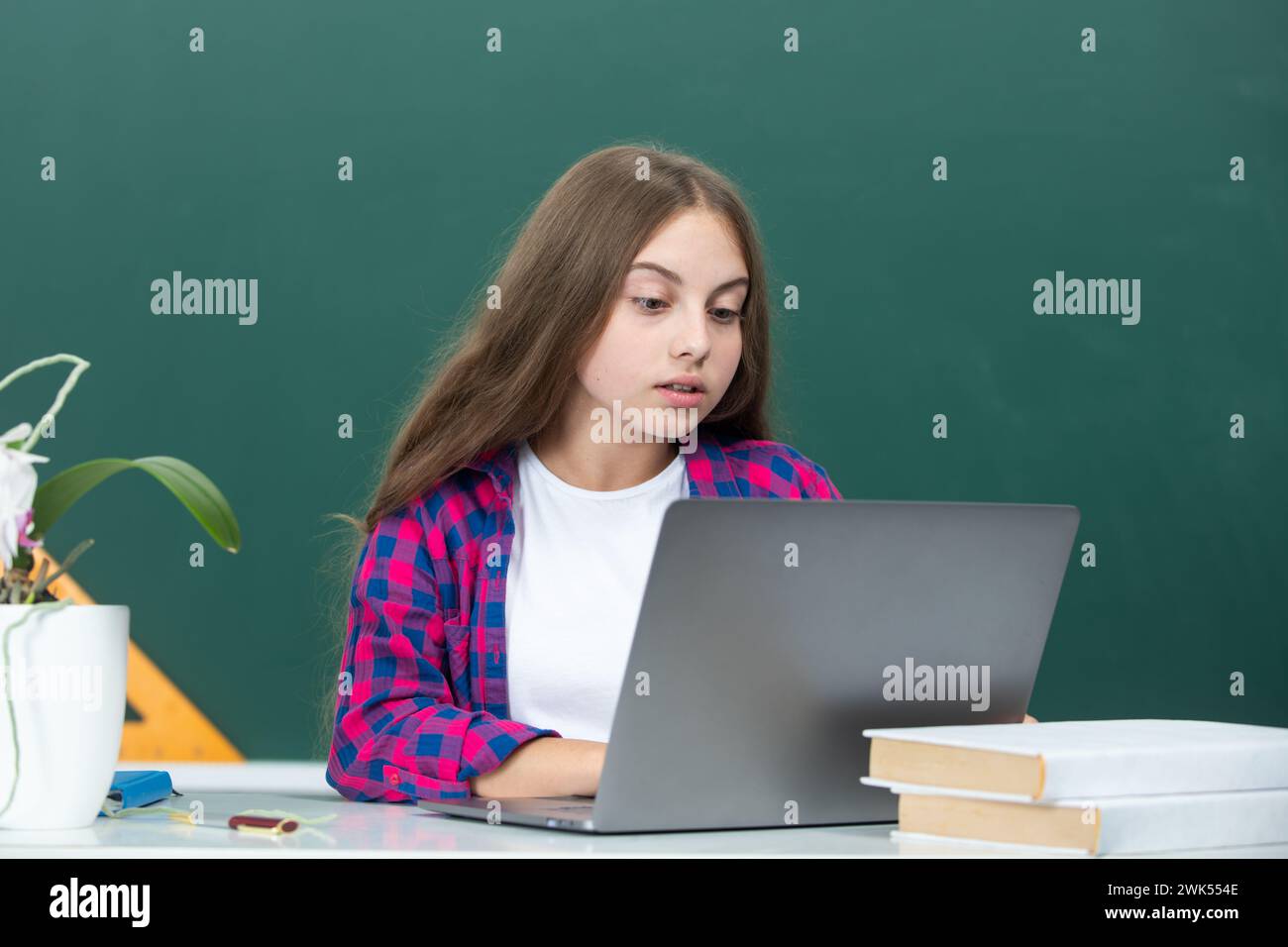 Teen girl school student with laptop at school. Teenager Student ...