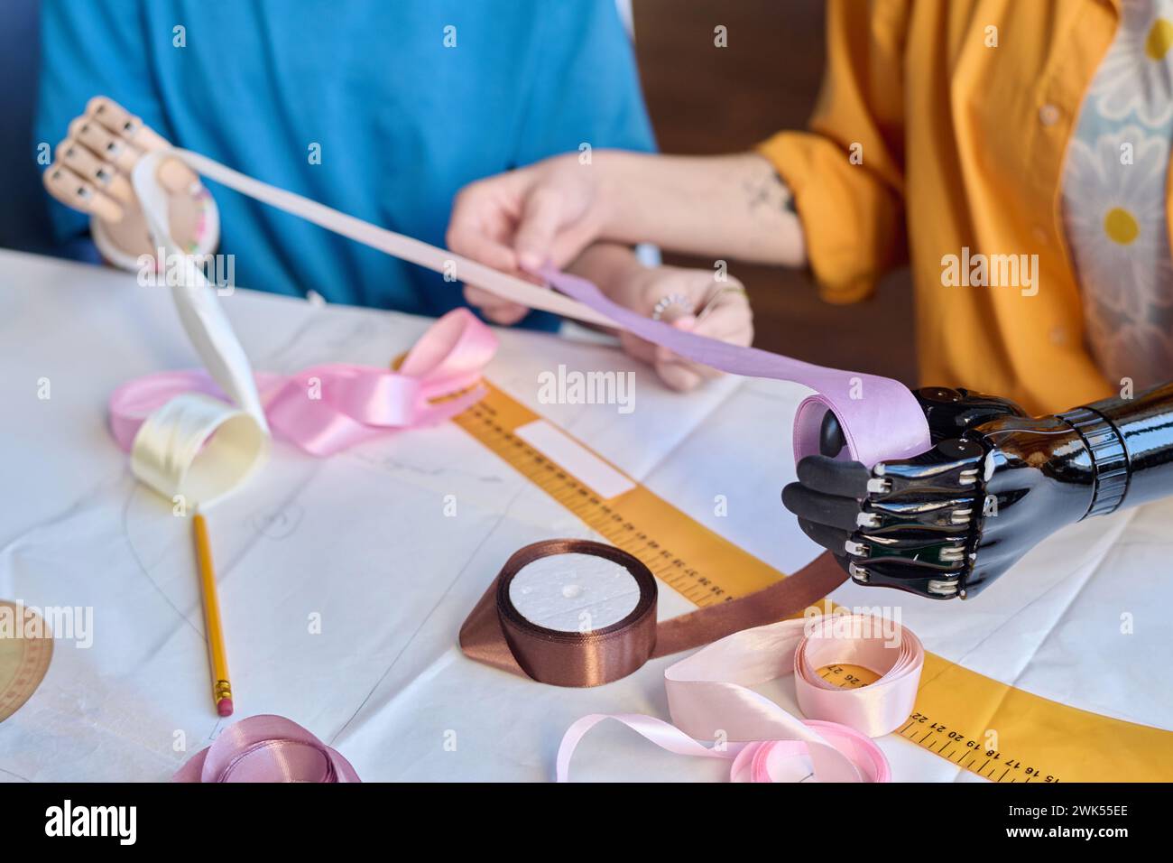 Hand holding inclusive workplace hi-res stock photography and images ...