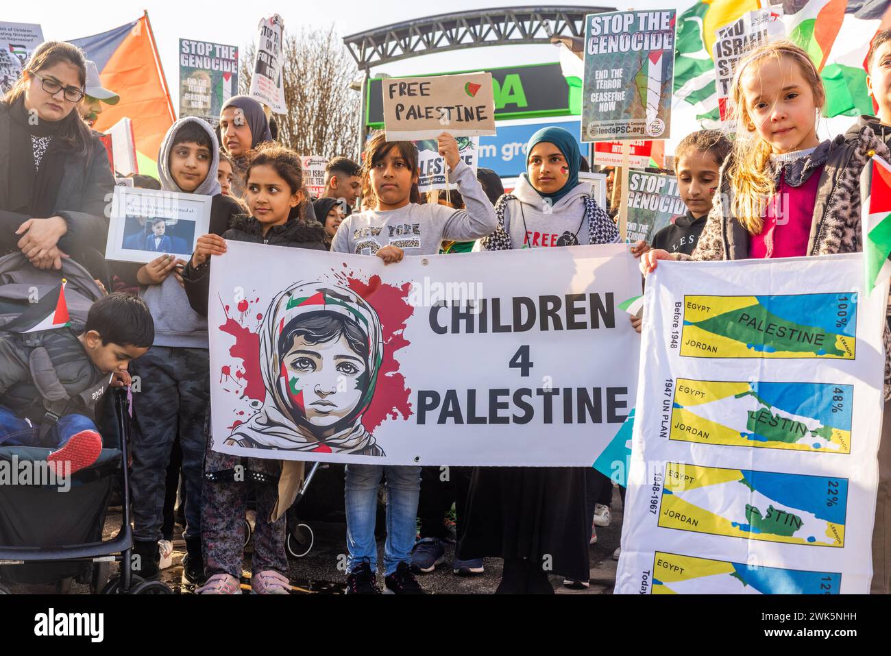 Wakefield, UK. 18 FEB, 2024. Group of pro palestine demonstrators gather on Wakefields first ever Palestine march. The march was led by several children holding various Wakefield for Palestine and Children for Palestine banners. The March started At ASDA on Dewsbury road and made its way into Wakefield city center. Credit Milo Chandler/Alamy Live News Stock Photo
