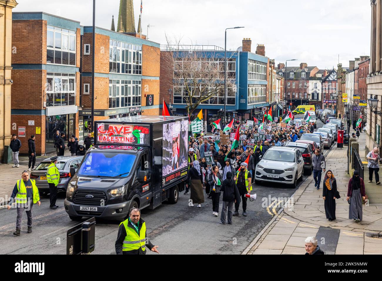 Wakefield, UK. 18 FEB, 2024. Pro Palestine demonstrators make their way through the streets of Wakefield on the cities first ever Palestine March . Credit Milo Chandler/Alamy Live News Stock Photo
