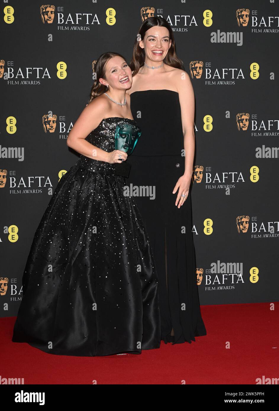 London, UK. 18th Feb, 2024. British actresses Mia McKenna- Bruce and Emma Mackie attend the Winners Room at the EE BAFTA Film Awards at Royal Festival Hall in London, England on Sunday, February18, 2024. Photo by Rune Hellestad/ Credit: UPI/Alamy Live News Stock Photo