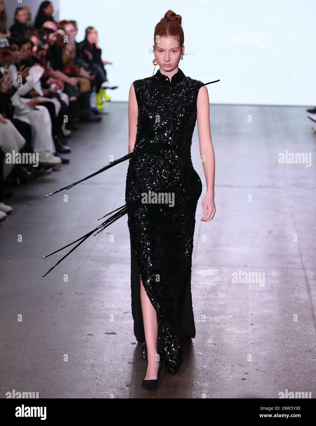 London, UK. 18th Feb, 2025. A model walks the runway during the SUNCUN