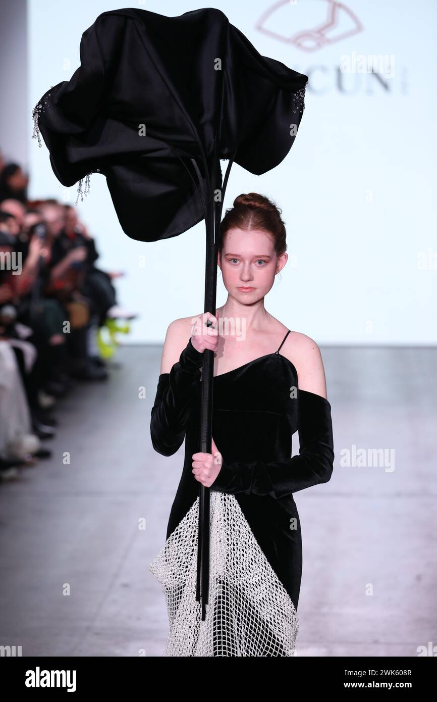 London, UK. 18th Feb, 2025. A model walks the runway during the SUNCUN