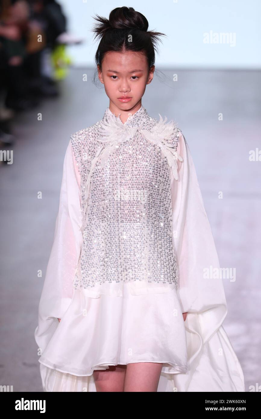 London, UK. 18th Feb, 2025. A model walks the runway during the SUNCUN