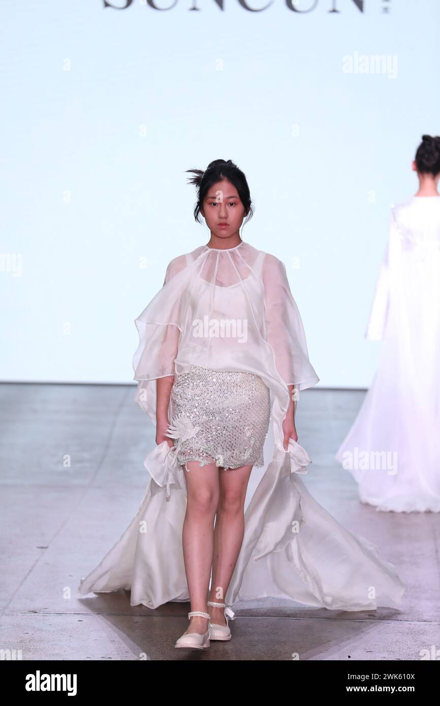 London, UK. 18th Feb, 2025. A model walks the runway during the SUNCUN