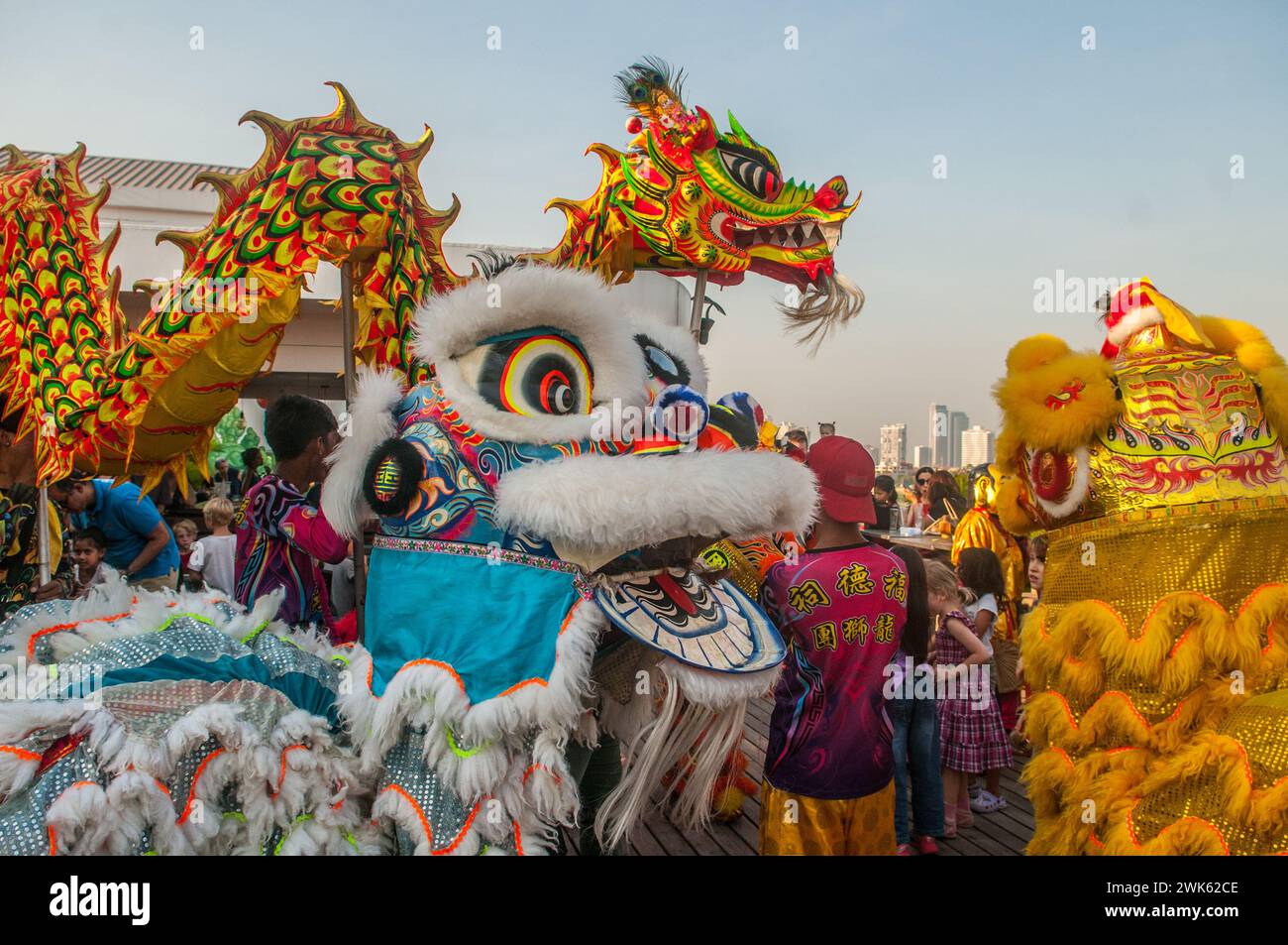 Dragon dancing & lion dancing simultaneously at a skybar for Chinese ...