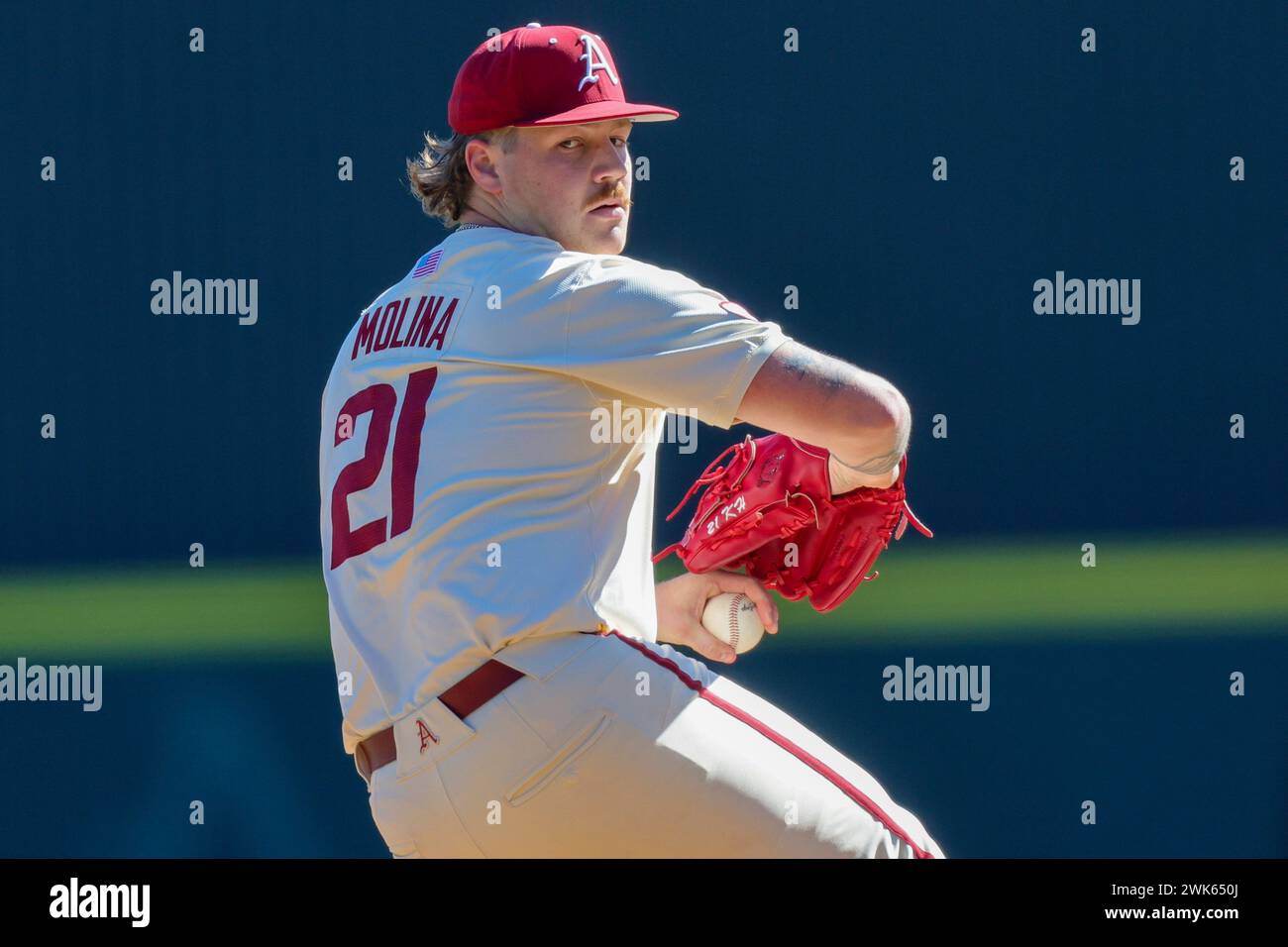 February 18, 2024: Arkansas pitcher Mason Molina #21 works from the ...