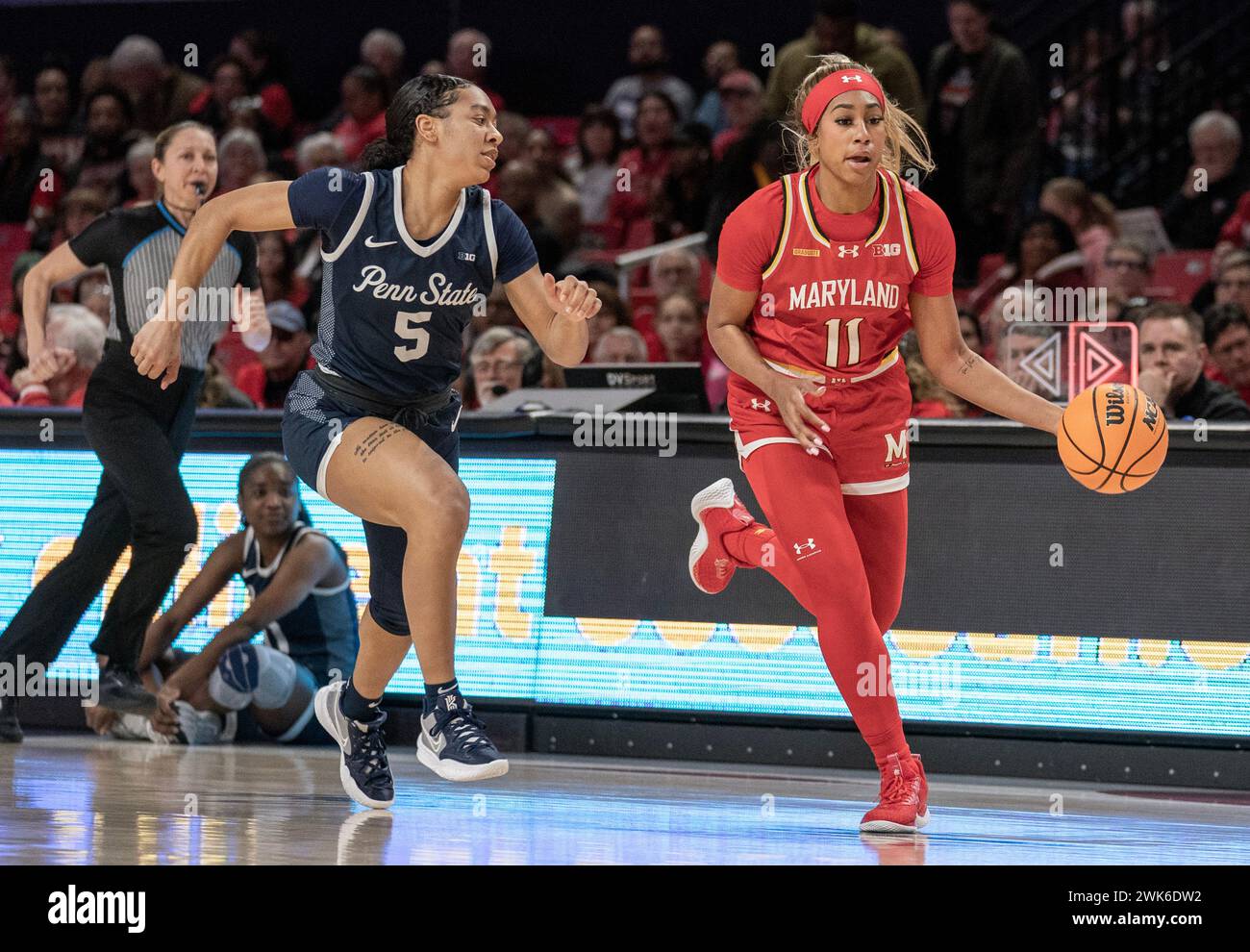 College Park, USA. 18th Feb, 2024. COLLEGE PARK, MD: - FEBRUARY 18: Maryland Terrapins guard Jakia Brown-Turner (11) breaks away from Penn State Nittany Lions guard Leilani Kapinus (5) during a women's college basketball game between the Maryland Terrapins and the Penn State Nittany Lions at Xfinity Center, in College Park, Maryland on February 18, 2024. (Photo by Tony Quinn/SipaUSA) Credit: Sipa USA/Alamy Live News Stock Photo