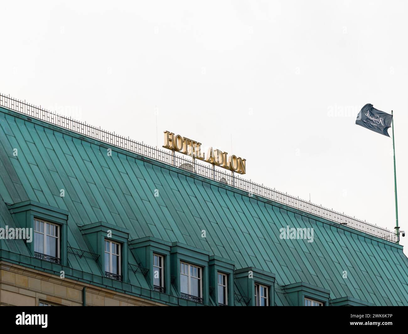 Hotel Adlon Kempinski logo sign on top of the building at the Pariser Platz. Famous luxury hospitality service next to the Brandenburger Tor. Stock Photo
