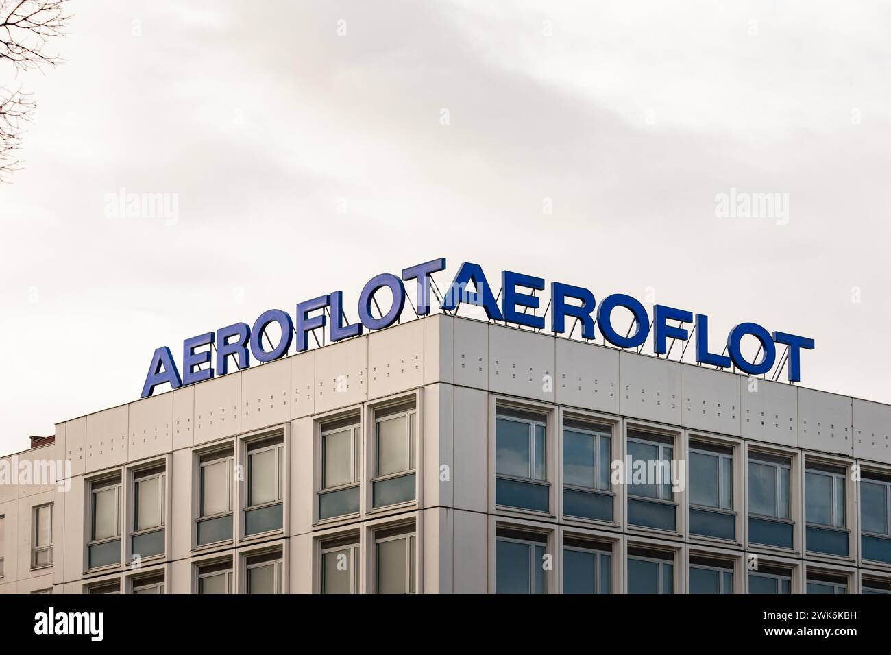 Aeroflot Russian airline logo sign on a building rooftop in Berlin. Advertisement for the aviation company. International transportation business. Stock Photo