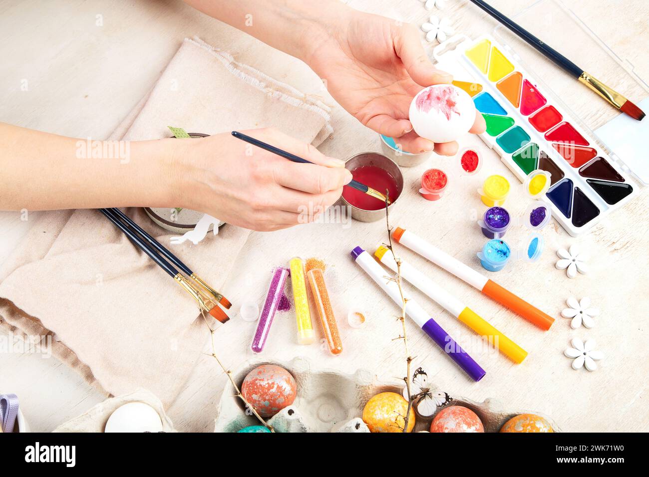 DIY Easter egg painting. Holidays and creativity. Tradition concept. Stock Photo