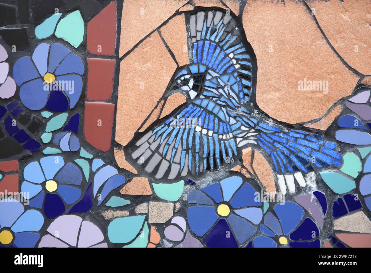 Wall mosaic with blue jay by Isidora Paz Lopez 2019, one, blue, Floridian jay, bird figure, flower figures, handicrafts, tiles, tiles, Lopez, rock Stock Photo