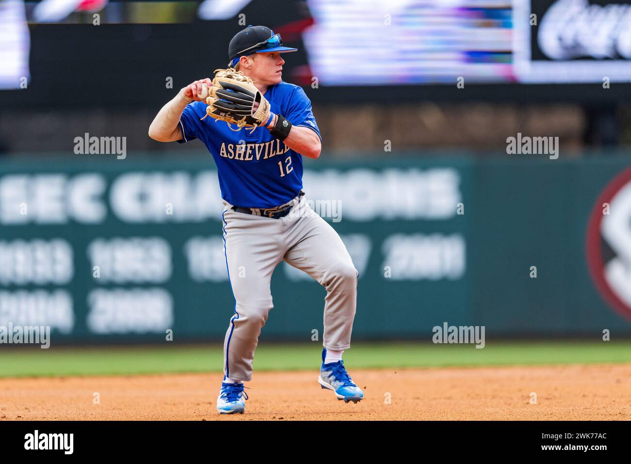 UNC Asheville infielder Ty Kaufman (12) throws to 1st base during an ...